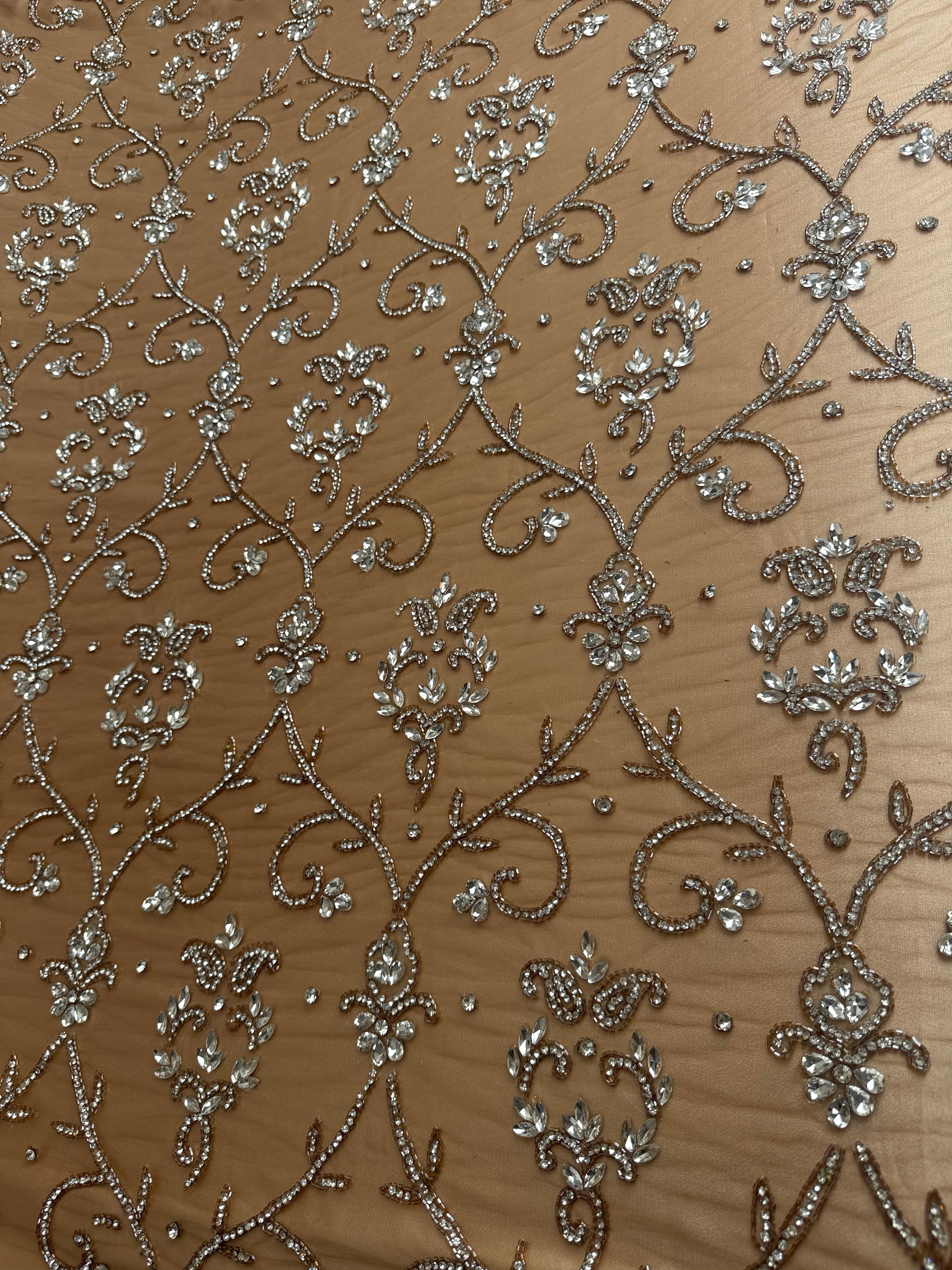 Coupon de tissu à cristaux
